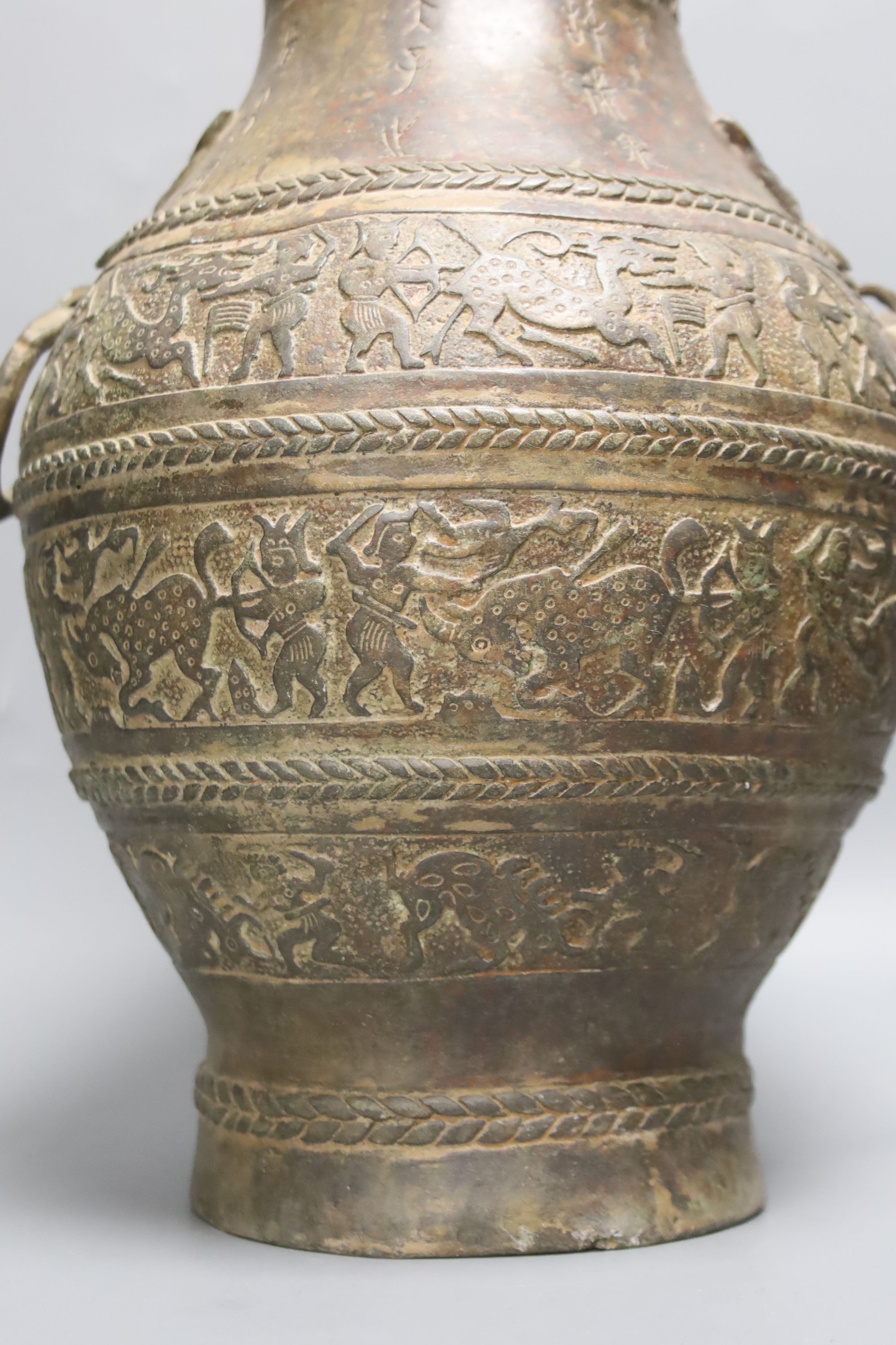 A Chinese cast bronze jar and cover, height 40cm